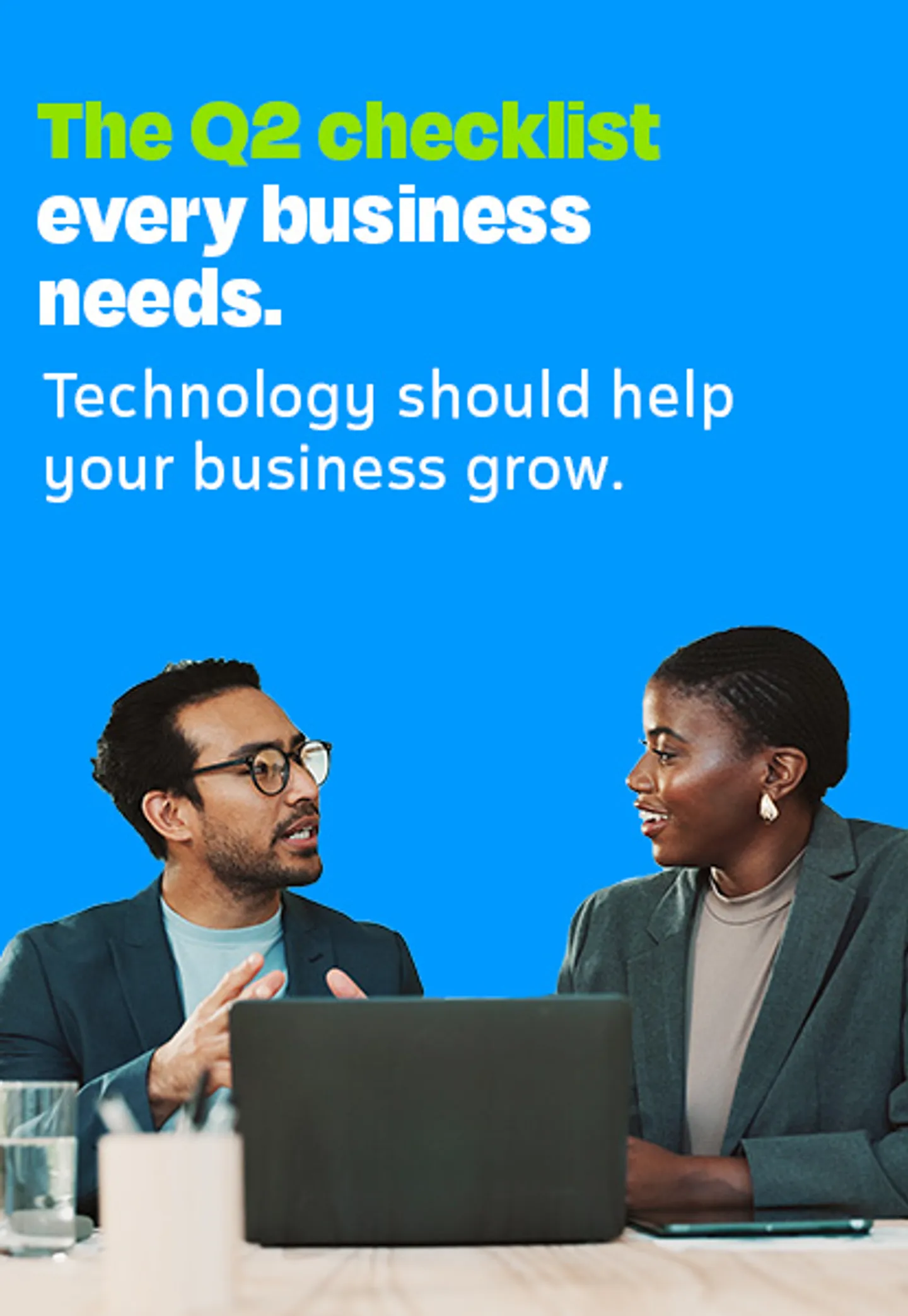 Small business team reviewing technology setup for Q2 growth