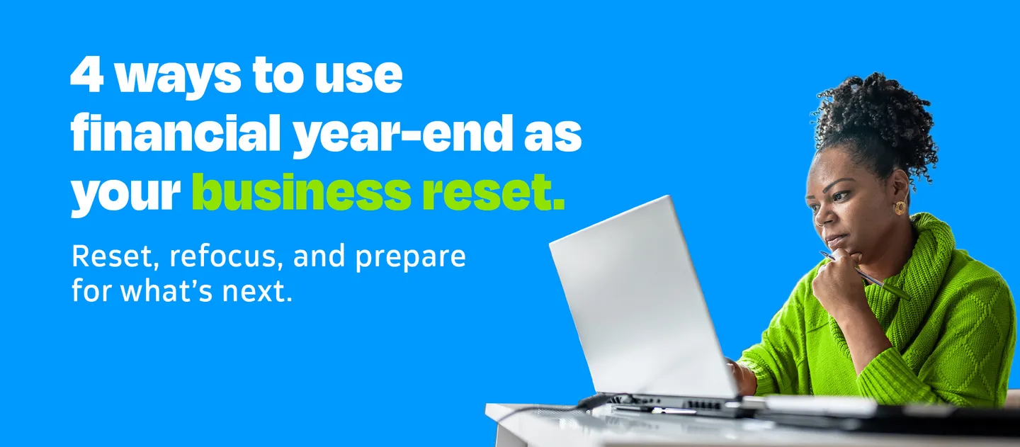 Business owner reviewing financial year-end reports